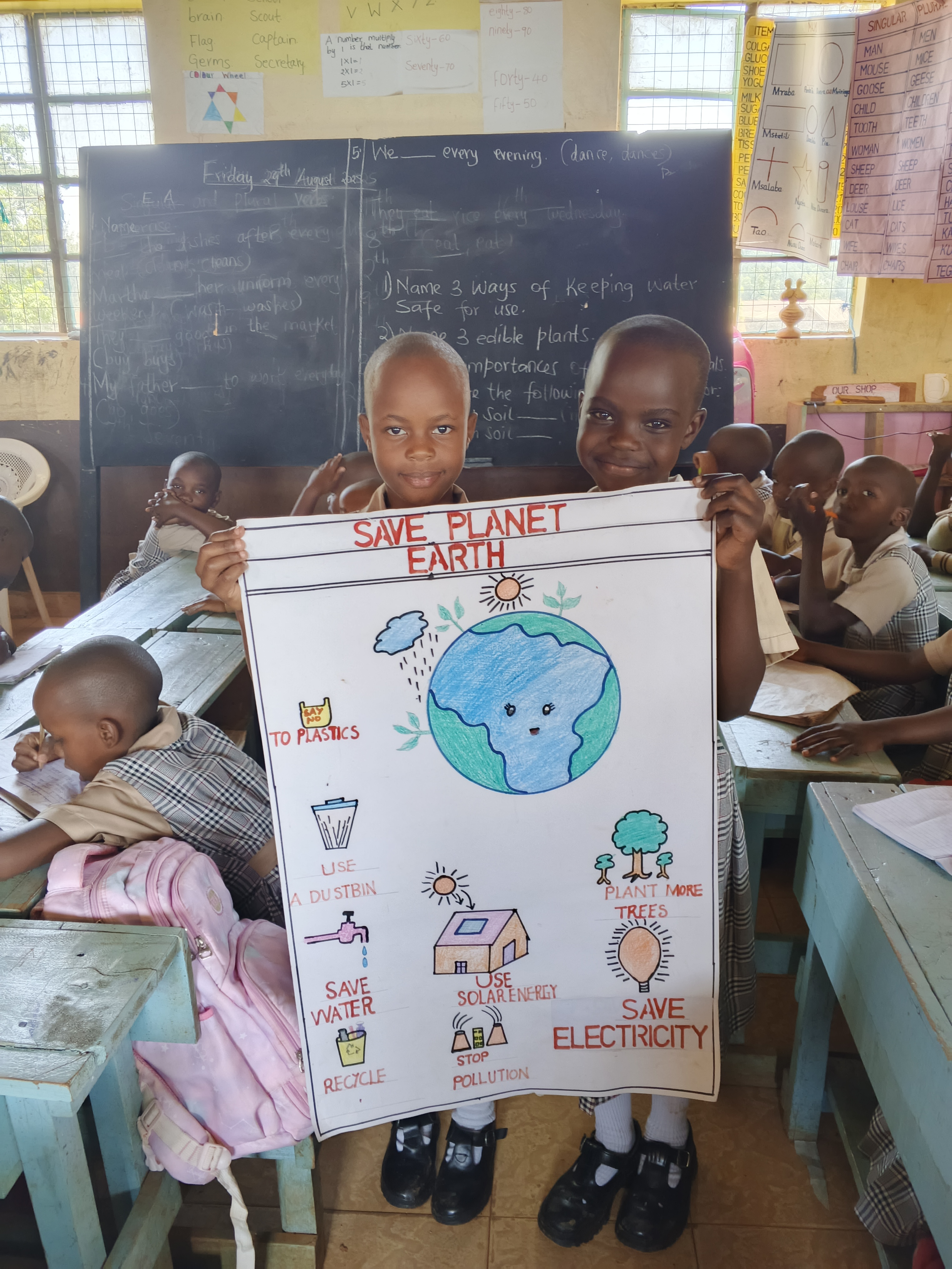 A student presenting their work during a class activity.
