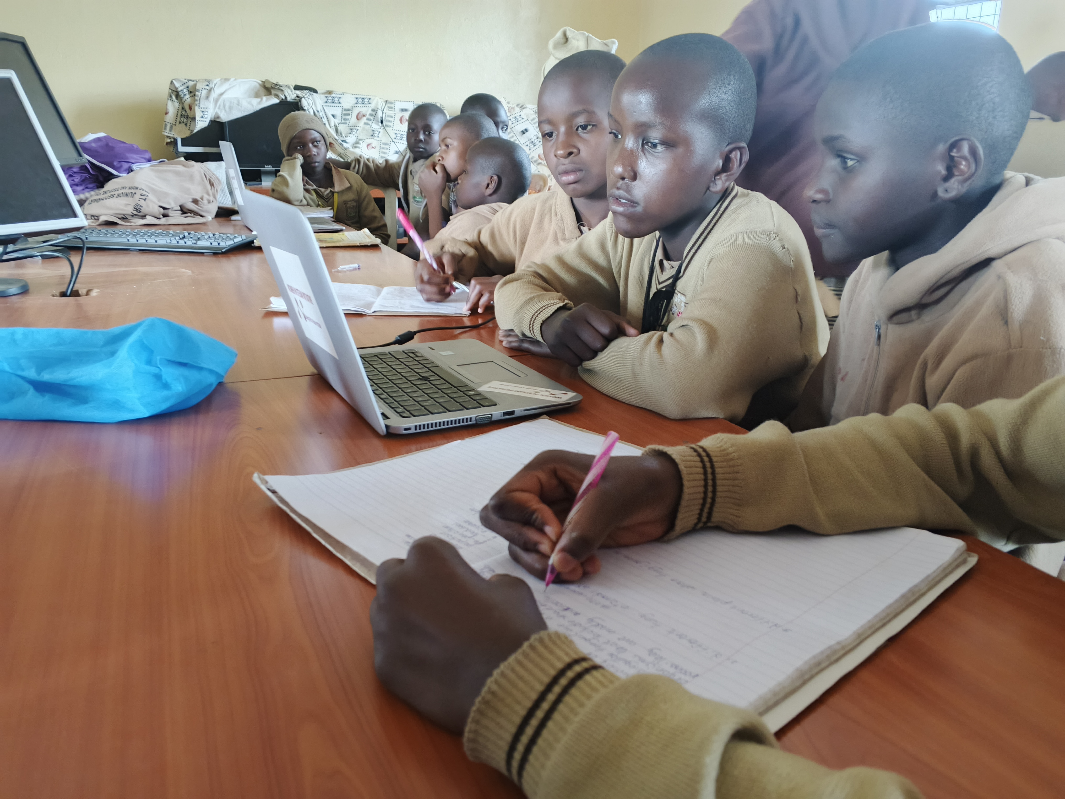 Students working together in a classroom setting.