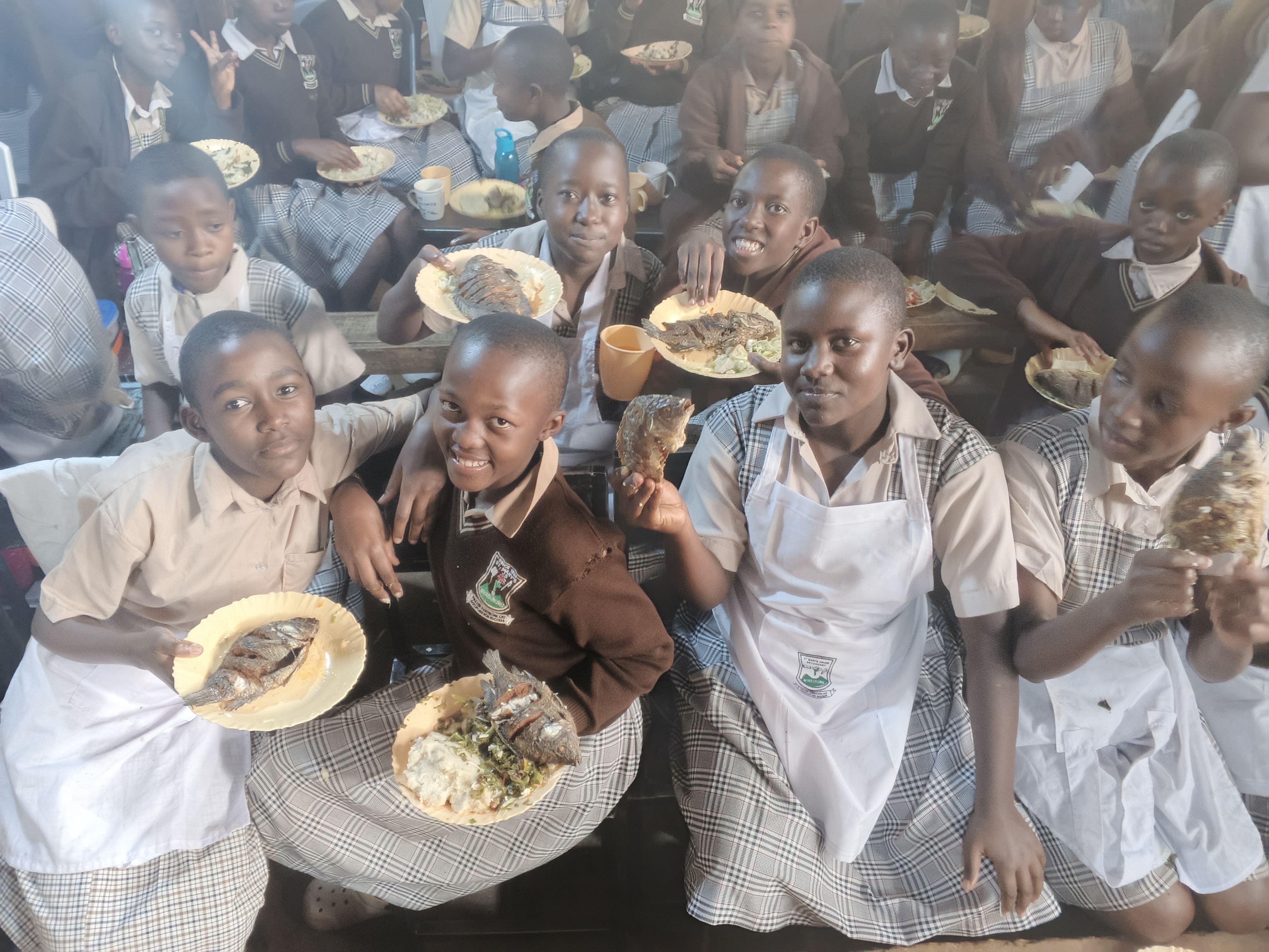 Students participating in a group activity outdoors.